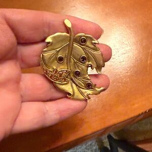 Elegant Gold Leaf Brooch with Brown Accents